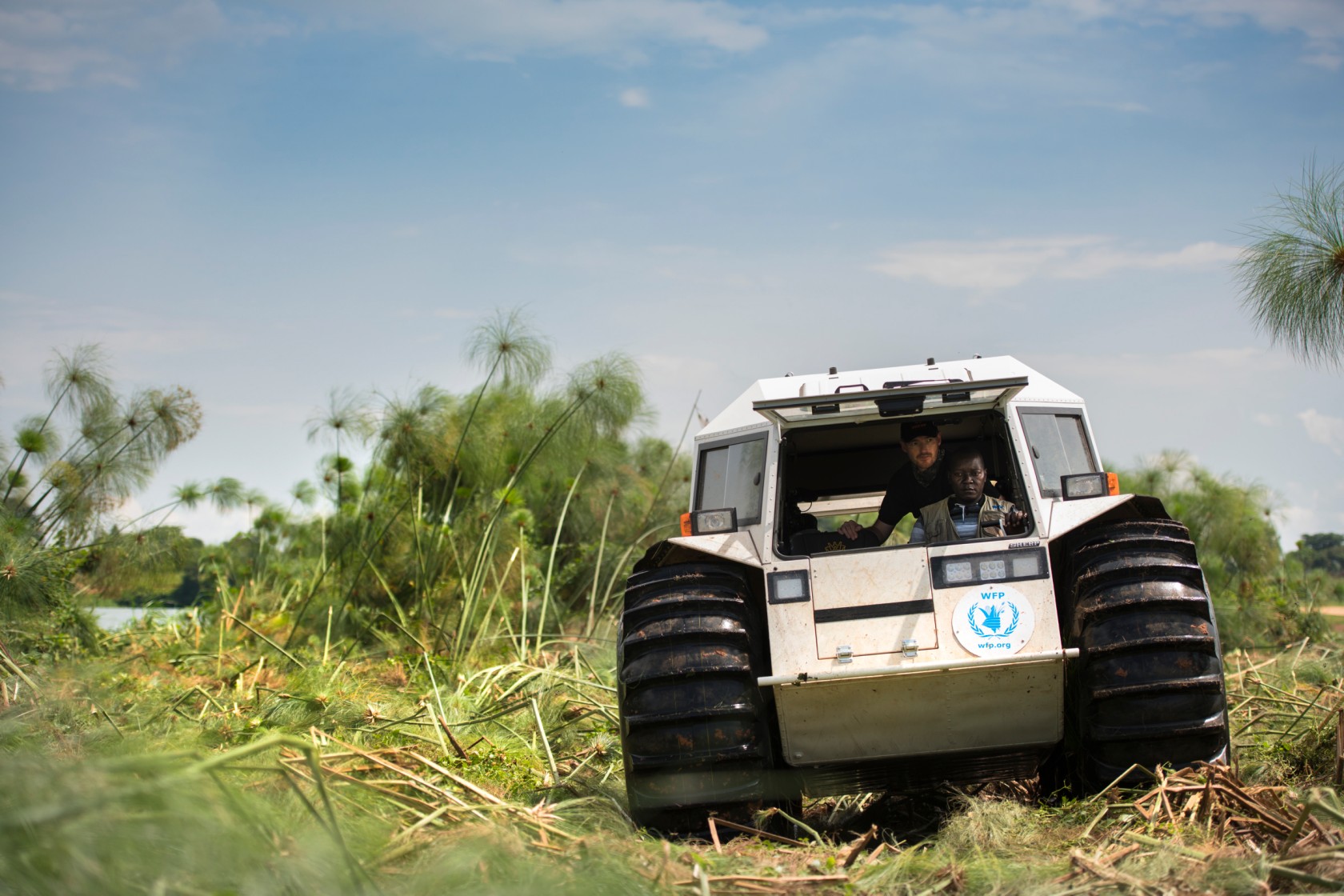 A Sherp traveling through swamp lands to save lives